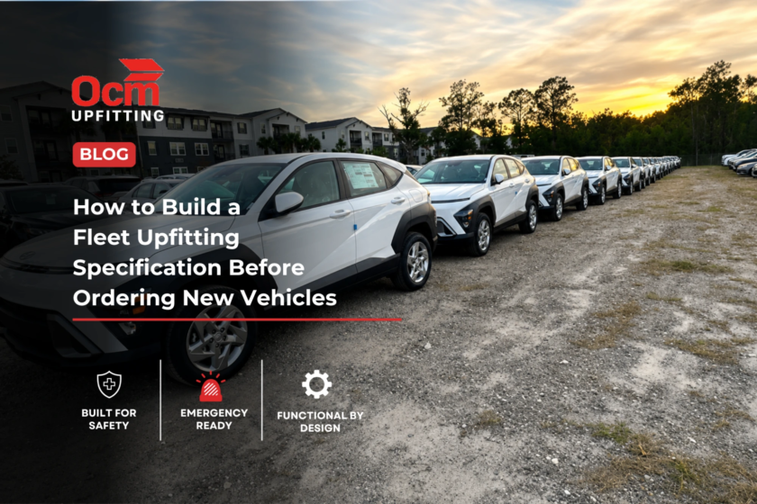 Long row of white fleet SUVs parked on a gravel lot at sunset, showcasing a newly delivered fleet vehicle lineup with uniform configuration, professional appearance, and a residential development in the background.