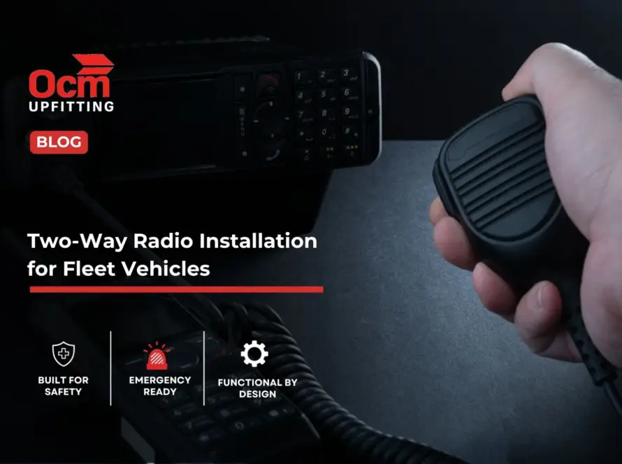 OCM Upfitting two-way radio installation for fleet vehicles featuring a mounted radio system, handheld microphone, and emergency-ready communication equipment.