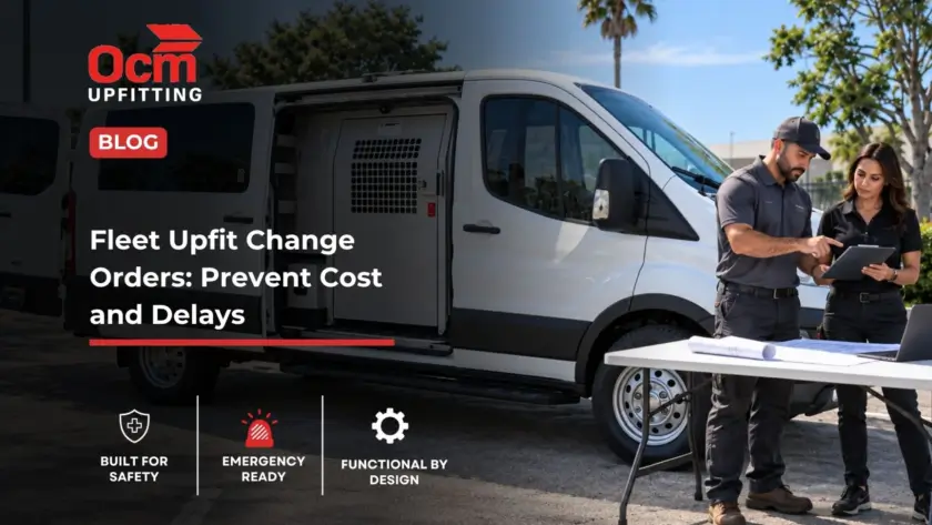 Two fleet professionals review vehicle upfit plans beside a white commercial van with an installed partition and interior equipment.