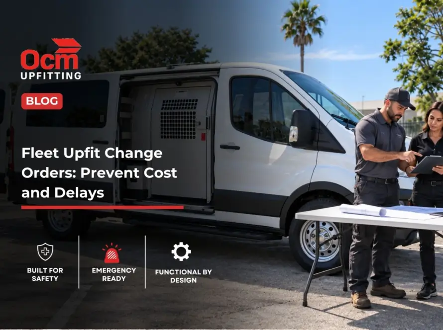 Two fleet professionals review vehicle upfit plans beside a white commercial van with an installed partition and interior equipment.